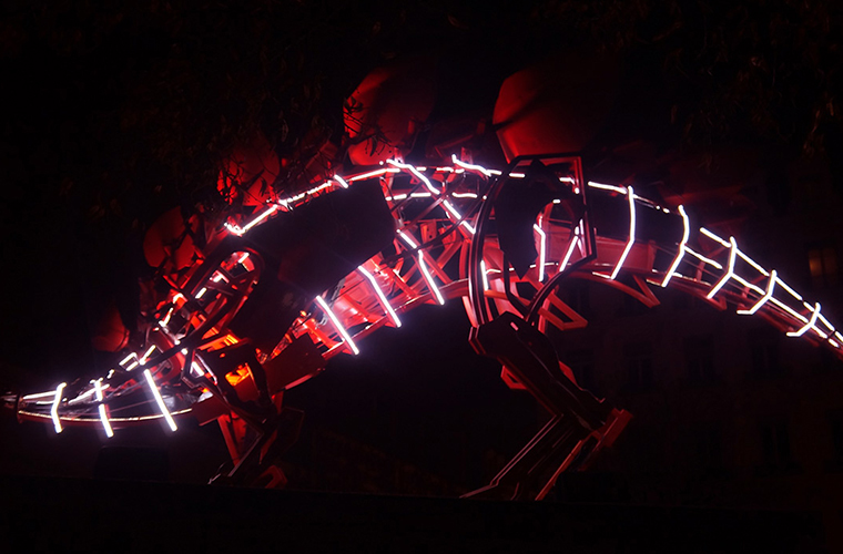 Melting sisters - Real life defying dinosaur in Lyon's festival of lights