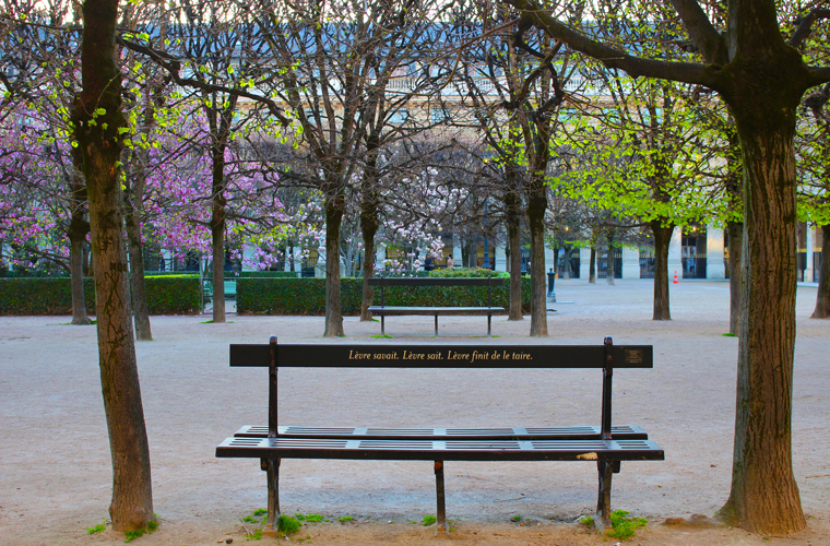 One year of the Covid-19 pandemic exploring unseen paris. The iconic bench at Palais Royal garden at sunrise