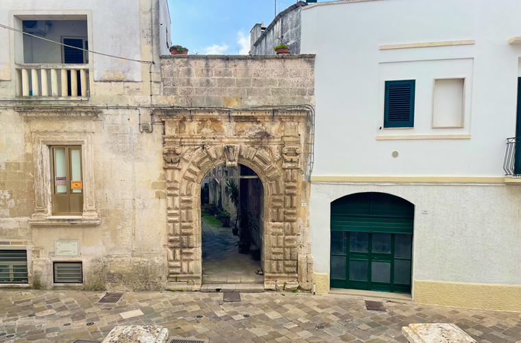 An ornate entrance opposite Chiesa Madre Parrocchiale di San Nicola Vescovo